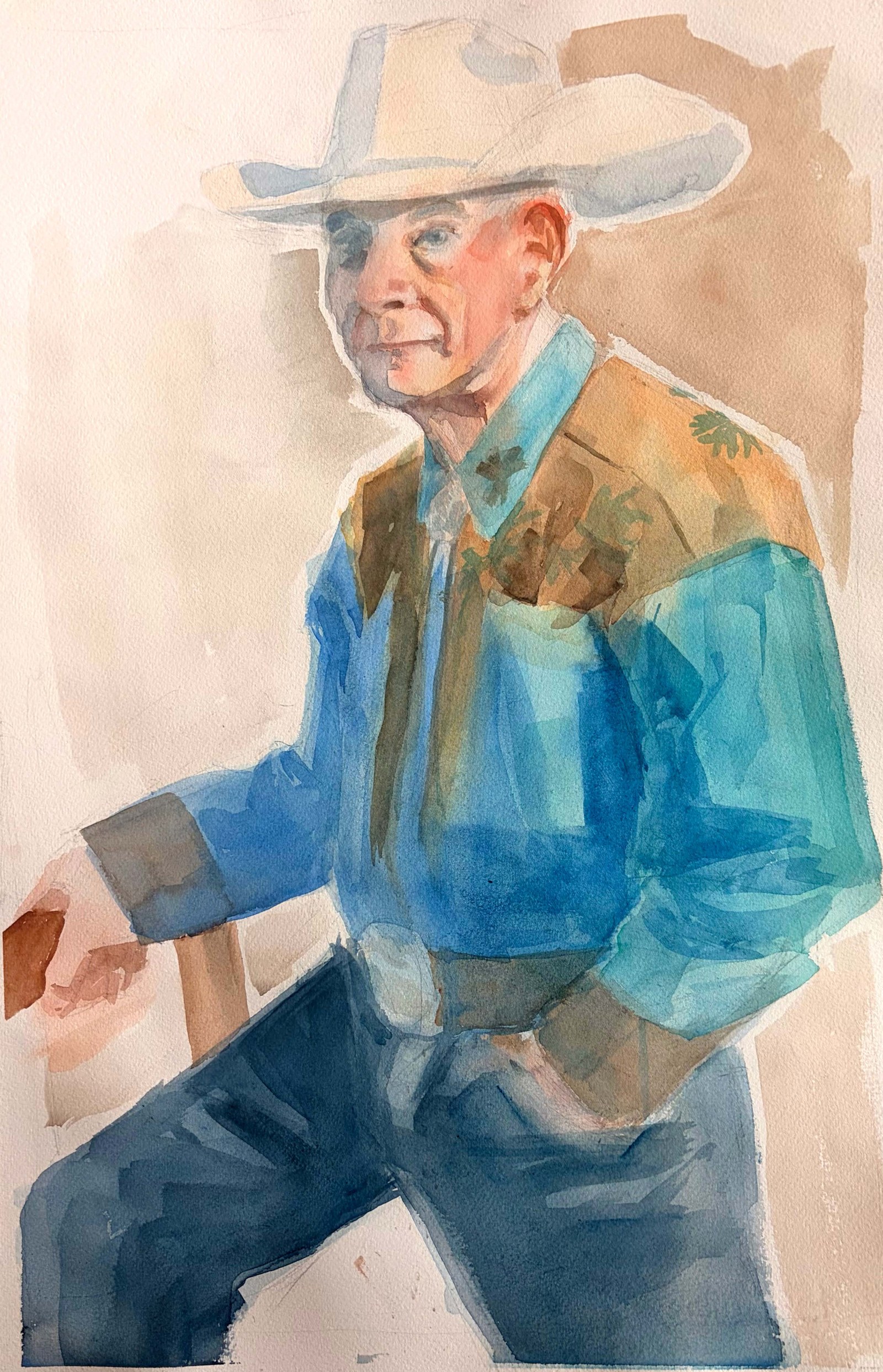 Man in Blue, a watercolour portrait of a man in a wide-brimmed hat and blue western shirt